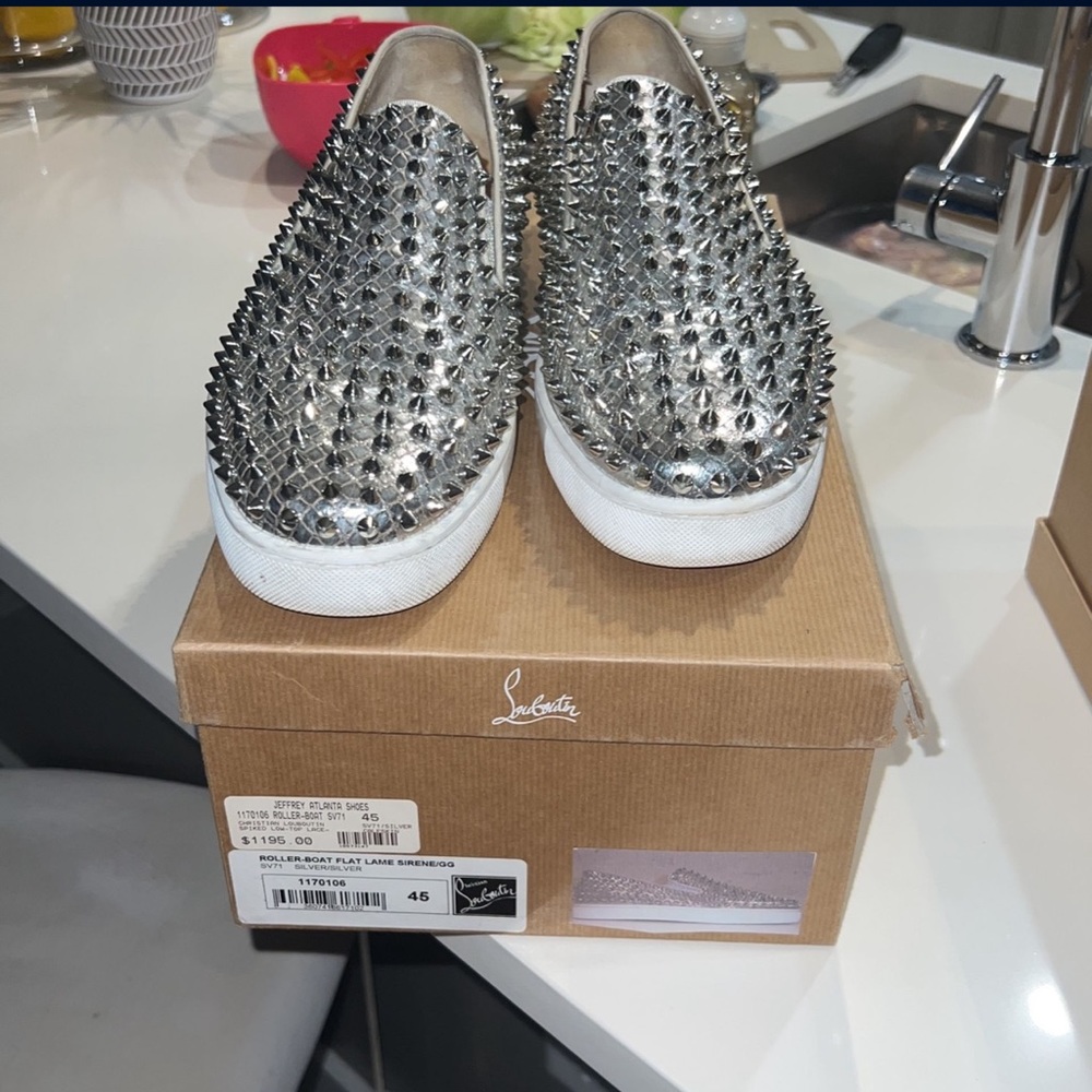 Silver Christian Louboutin flats
